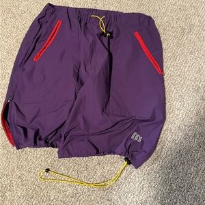 NWOT Topo Designs Purple Athletic Skirt with Red and Yellow Details